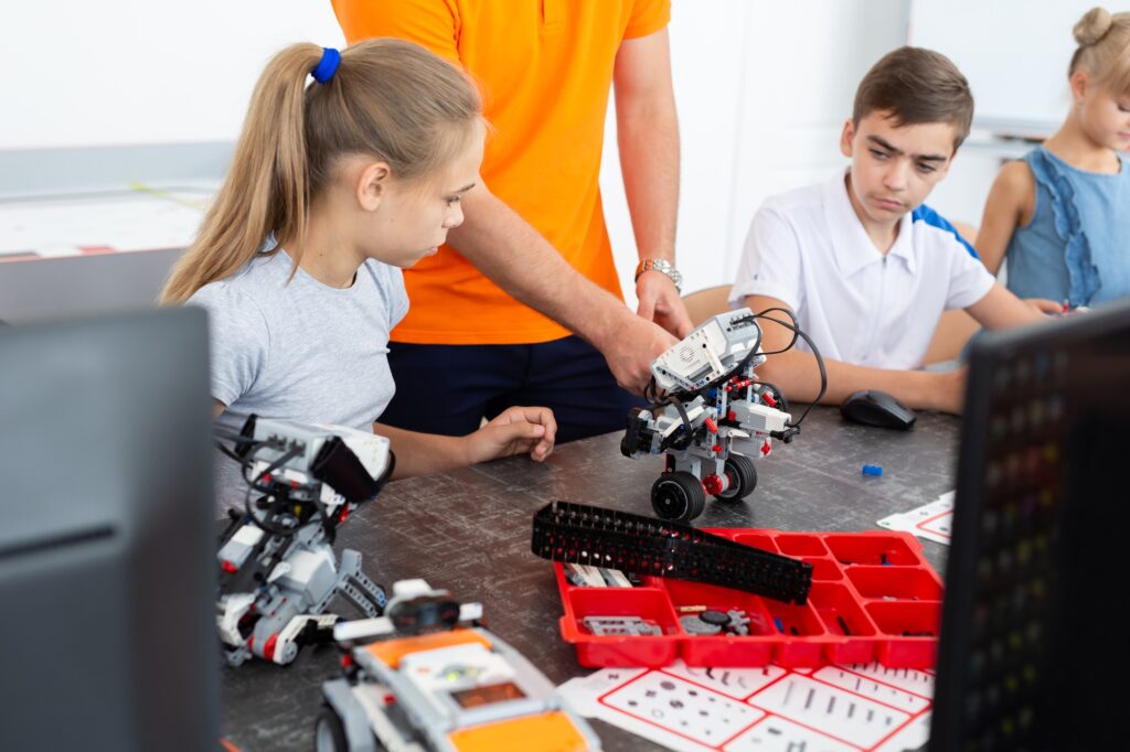 Children in a robotics class in the classroom